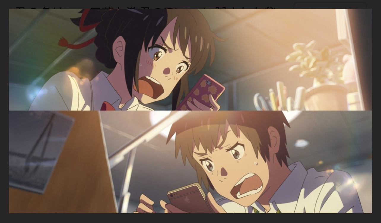 携帯をいじる男女
