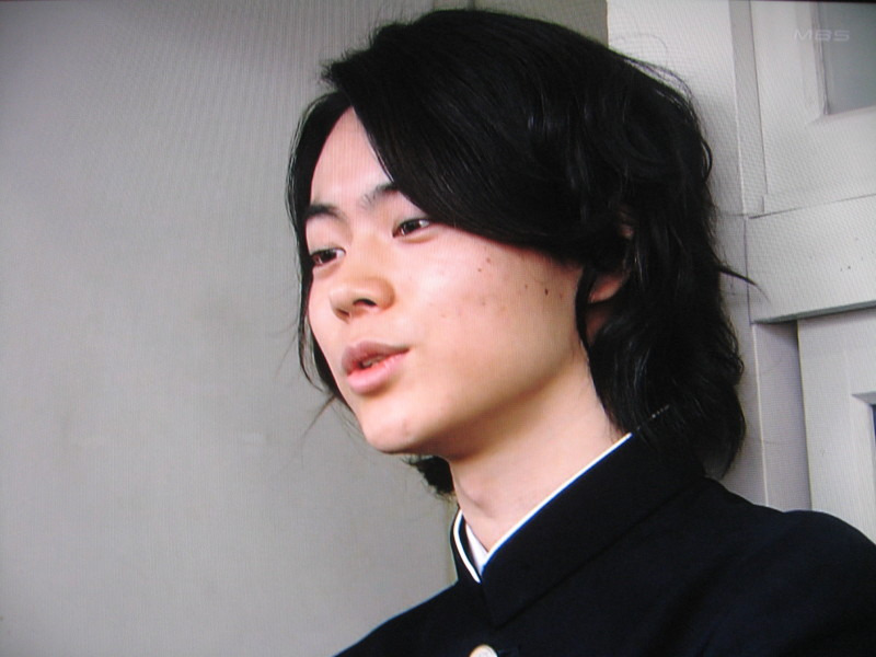 長髪の男
